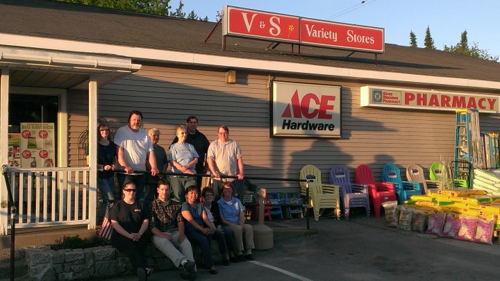 Island Employee Cooperative board standing in front of one of the stores they bought on June 11, 2014, becoming Maine's largest worker-owned cooperative.