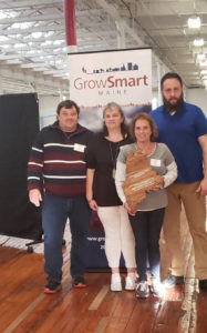 From left to right: Charter Oaks Village residents Steve Staples, Shannon Staples, Ann Lantagne, Marcus Baldwin at GrowSmart Summit holding their 2019 Smart Growth Award